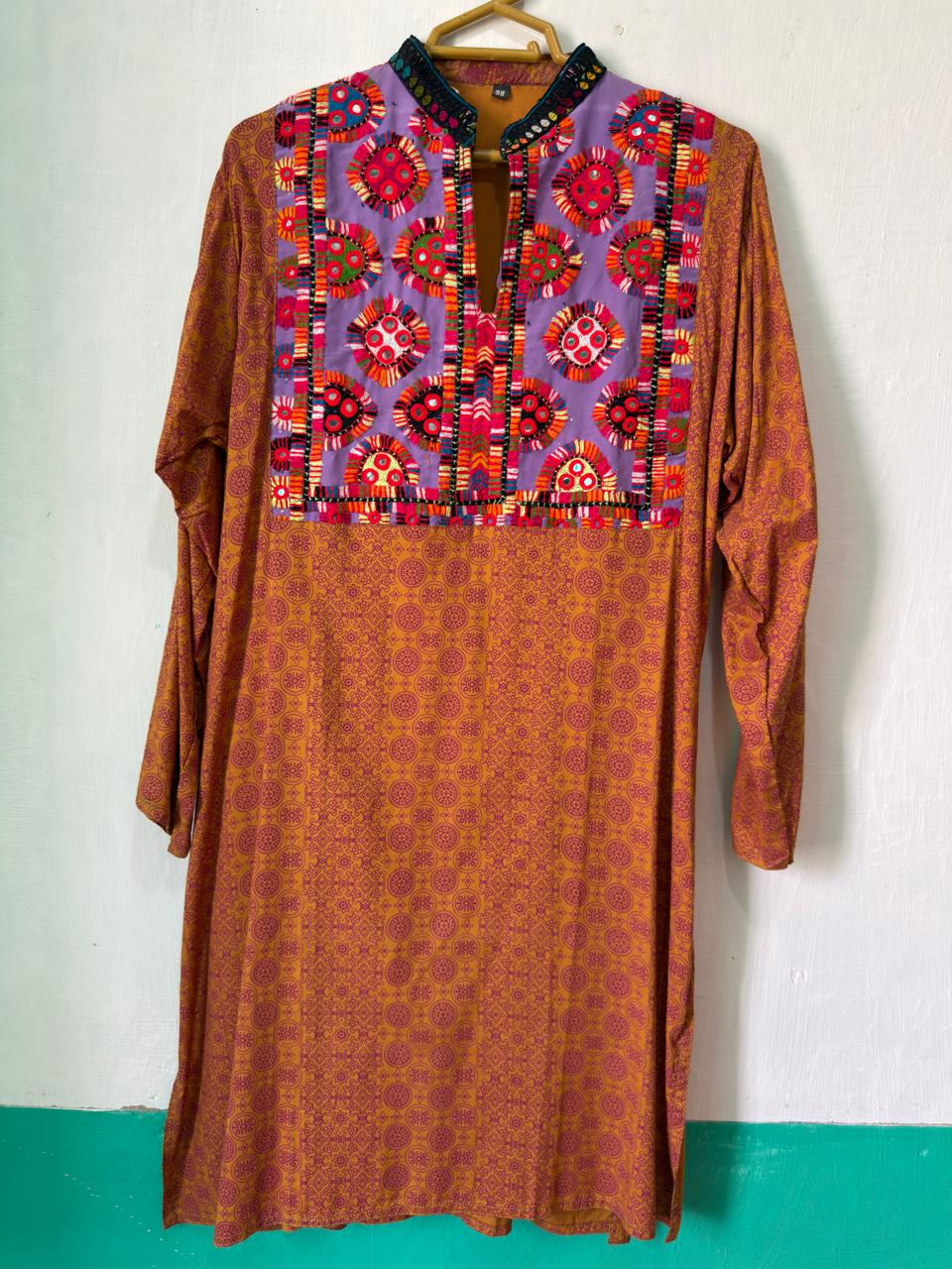 Sindhi embroidered kurta in amber floral — Karvora Global artisan network