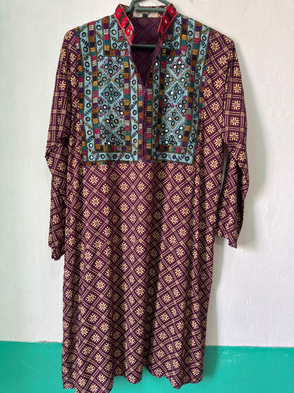 Sindhi embroidered kurta in maroon and teal — handmade artisan craft from Pakistan